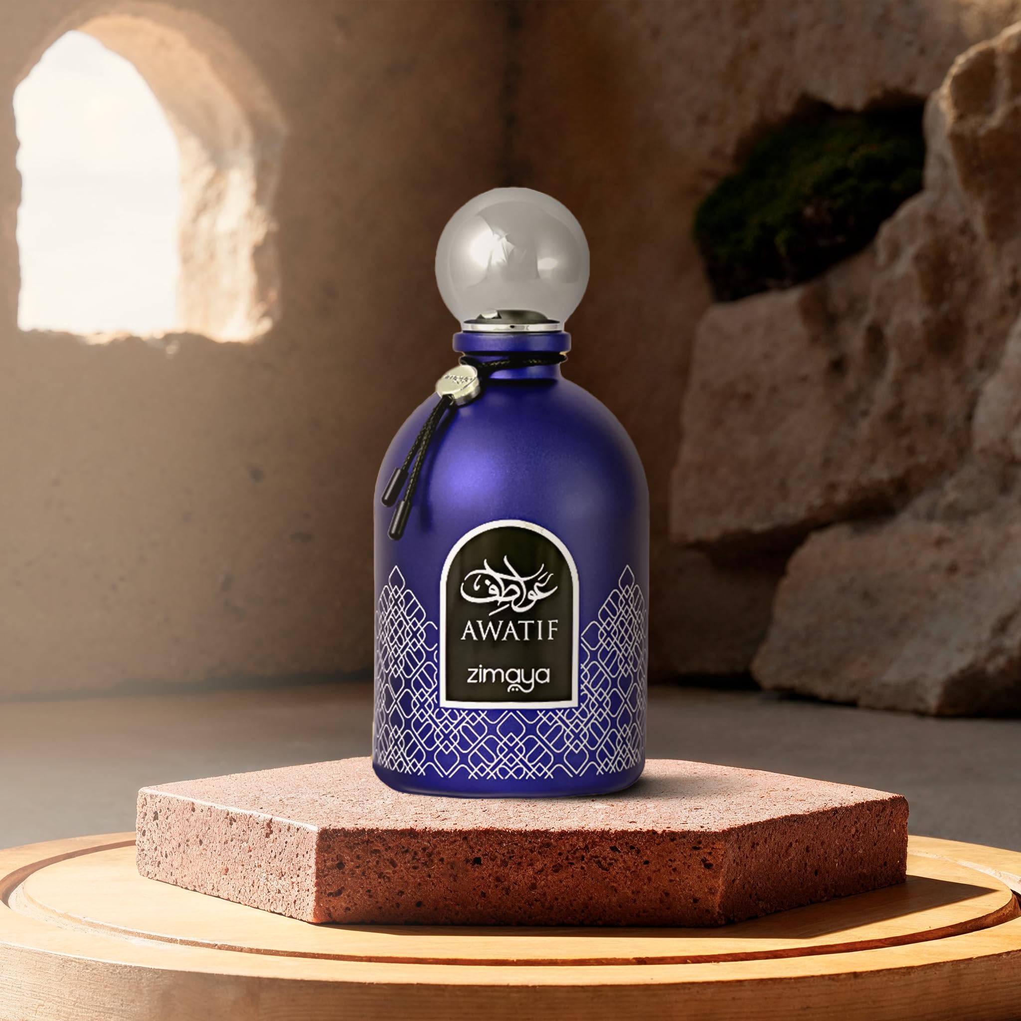 zimaya Awatif Pour Homme packaging and glass bottle on display for confident style