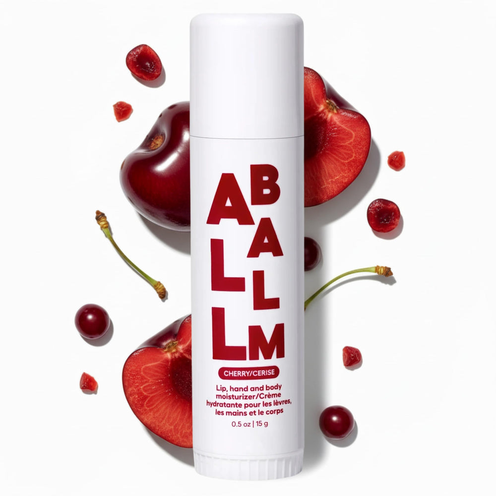 Zizia Botanicals Cherry Multi Balm Stick on lips for smooth hydration