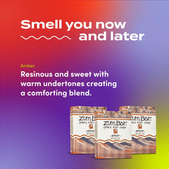 Zum Indigo Wild soap amber bar in hand demonstrating use for daily cleansing.