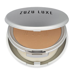 Zuzu Luxe Dual Powder Foundation D-24 compact close-up shows a matte, oil-control finish.