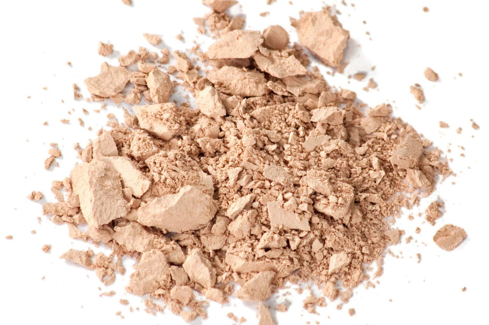 Zuzu Luxe Dual Powder Foundation D-7 packaging detail highlighting travel-friendly design.