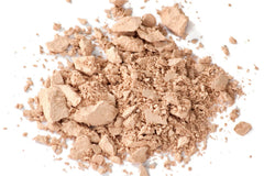 Zuzu Luxe Dual Powder Foundation D-7 packaging detail highlighting travel-friendly design.