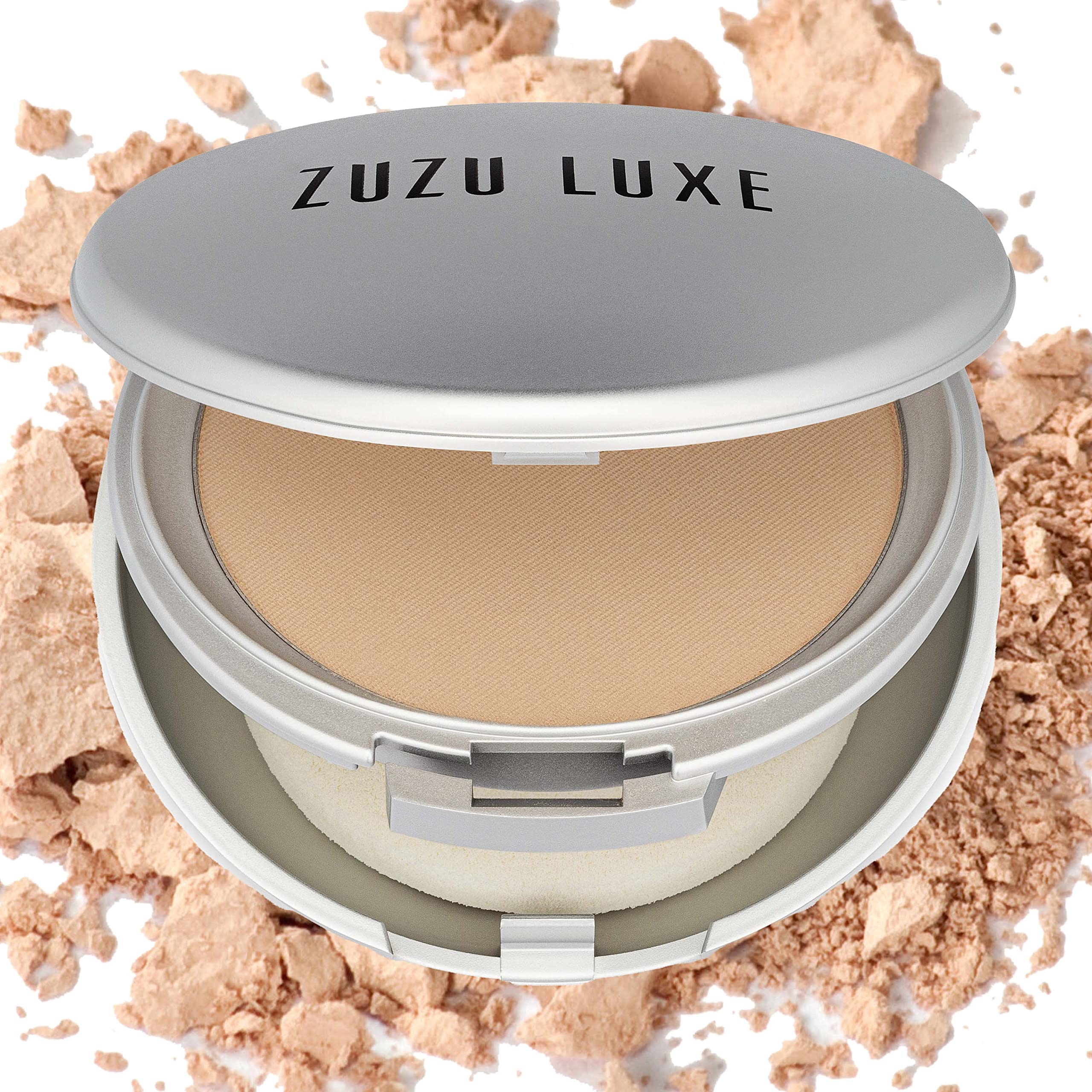 Zuzu Luxe Dual Powder Foundation D-7 swatch on skin showing natural finish.