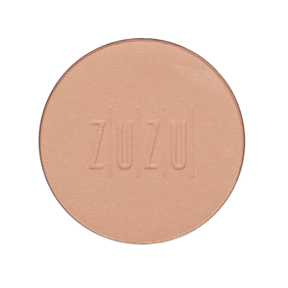 Close-up of Zuzu Luxe dual foundation texture for seamless medium to full coverage.